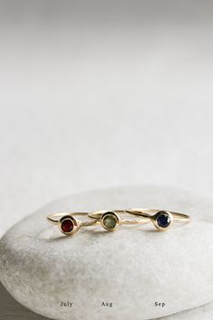 The bezel set birthstone ring is the perfect piece to celebrate those you love or yourself... or both! Add rings to stack as your family grows or incorporate your bestie or your extended family. This ring is very versatile and meaningful. Celebrate your loved ones everyday by keeping them close every day! Style this ring with another JP BIRTHSTONE RING for a fun colorful stack or create a modern look with the JP KNIFE EDGE BAND. PLEASE NOTE THE BIRTHSTONE SELECTION [CHOOSE DIAMOND OPTION FOR APR Down Arrow Icon, Icon Jewelry, Stack Ring, Extended Family, Bag Icon, Swiss Blue Topaz, Ruby Ring, Baguette Diamond, Birthstone Ring