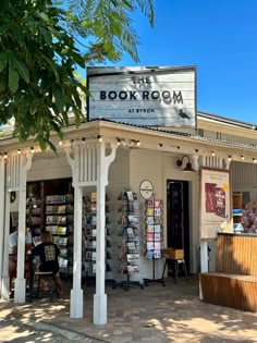 the book room at town is located in an old - fashioned building with white pillars