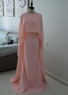 This Dress is fashionable for every occasion. the dress is made-to-order by professional tailors. You can choose from 50 colors, Regular sizes 2 to 16 and plus sizes 14w to 26W. Custom size is also available.. The product details: Color: Blush Pink, Silhouette: Mermaid, Neckline: Jewel, Waistline: Natural Waist, Length: Long, Primary Fabric: Chiffon Prom Dress With Cape, Dress With Cape, فستان سهرة, Grad Dresses, Color Blush, Chiffon Prom Dress, Cape Dress, Modest Fashion Outfits, Abayas Fashion