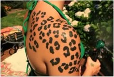 a woman with leopard print on her back