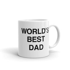 a white coffee mug with the words world's best dad in black on it