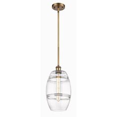 a glass and brass pendant light fixture