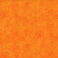 an orange background with gold stars