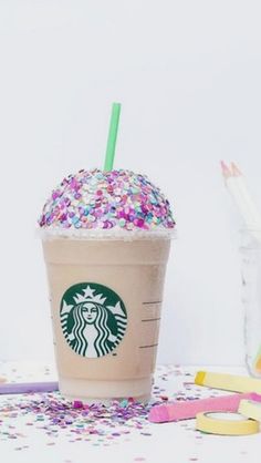 a starbucks drink with sprinkles on it