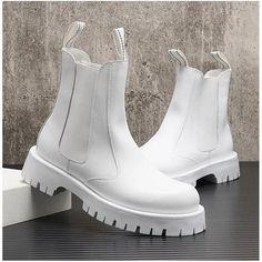 QFFAZ Men's White Platform Ankle Boots Make a bold statement with the QFFAZ Men's White Platform Ankle Boots. These edgy and stylish boots feature a striking platform design, perfect for adding a touch of attitude to any outfit. Crafted with a combination of genuine leather and synthetic materials, these boots offer both comfort and durability. Key Features: Platform Design: Add height and a touch of attitude with the platform sole. Genuine Leather Upper: Enjoy the luxurious feel and durability Men White Boots, White Boots Men, White Boots For Men, Mens White Boots, Men Casual Boots, Footwear Ideas, High Top Tennis Shoes, Planning List, Casual Punk