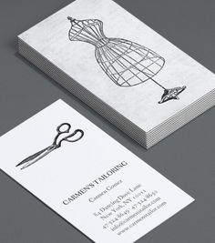 the business card is designed to look like a dressmaker's skirt and scissors