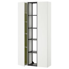 a tall white cabinet with shelves in it