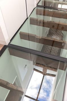 an image of a glass staircase going up to the sky