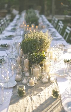 a photo collage of a bride and groom sitting at a table with candles on it