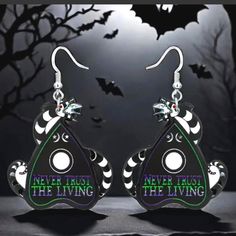 New Beetlejuice Sandworm "Never Trust The Living" Acrylic Black White Green Earrings Goth Halloween These Unique Earrings Are Great For Halloween Or Everyday Attire! Discounted Shipping For Jewelry *Add To Your Bundle, Let's Make A Deal And Save On Shipping!! Reasonable Offers Appreciated. Thanks For Stopping By And Have A Perfectly Haunted Day Beetlejuice Sandworm, Earrings Goth, Never Trust The Living, Halloween Color, Let's Make A Deal, Goth Halloween, Never Trust, Green Earrings, Halloween Coloring