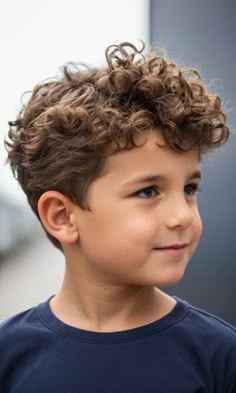 Discover the perfect hair cut for curly hair boys! This trendy boys haircut features a long top with curly hair, ideal for boys hairstyles with curly hair. Find inspiration from toddler boy hairstyles curly, little boy hair cuts curly, and curly haircuts for toddler boys. Whether you're looking for a wavy toddler boy haircut, wavy boys haircut, or a curly kids haircut, this style is versatile and stylish. Perfect for all ages, including toddler wavy haircut boy options! ✂️👦✨ #CurlyKidsHaircut #WavyBoysHaircut #LittleBoyHairCutsCurly Curly Hair Aesthetic Boy, Curly Kids Haircut, Hair Cuts For Curly Hair For Boys, Short Sides Curly Top Men, Toddler Surfer Haircut, Toddler Boy Haircuts Curly, Toddler Mullet Haircut, Boys Haircut For Curly Hair, Curly Haircut For Boys