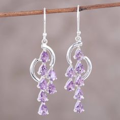 Graceful curves of sterling silver support a glittering cascade of pear-shaped faceted amethyst totaling seven carats. Elegant and beautiful, these handcrafted dangle earrings are presented by Chintan of India. Violet Earrings, Waterfall Earrings, Jewelry Real, Earrings Purple, Fantasy Jewelry, Silver Jewellery, Pear Shaped, Clothing Items, Jewelry Earrings Dangle