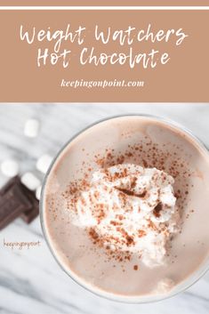 a hot chocolate drink with whipped cream on top and the words weight watchers hot chocolate above it