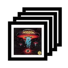 four framed pictures of the cover art for boston, including an image of a flying saucer