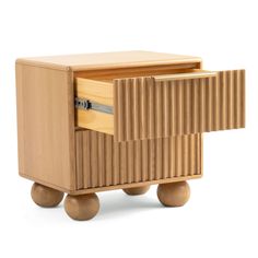 a small wooden box with wheels on it's sides and an open drawer in the middle