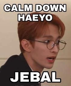 a young man with glasses is making a funny face and has the caption saying, calm down haeyo jebal