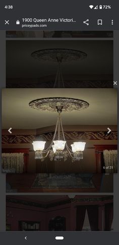 an image of a chandelier in the middle of a room with curtains on it