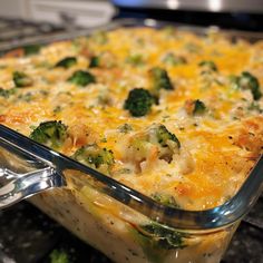 a casserole dish with broccoli and cheese