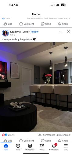 a living room filled with furniture and a flat screen tv mounted to the side of a wall