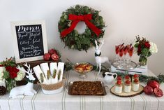 the table is covered with food and decorations