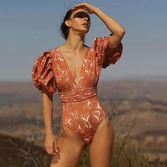 Luciana Puff Sleeves Desert Floral One Piece Swimsuit Black Monokini, Backless One Piece Swimsuit, Long Sleeve Swimwear, Backless Swimsuit, Orange Swimsuit, Swimsuit With Shorts, Black Bathing Suits, Floral One Piece Swimsuit, Floral One Piece