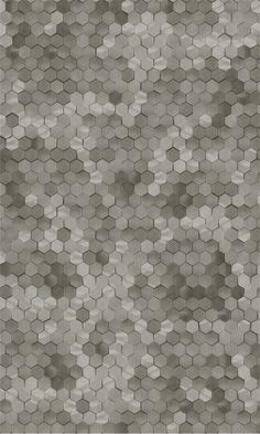 a black and white photo of hexagonal tiles