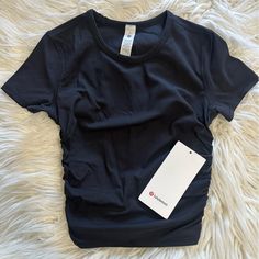 Lululemon All It Takes Tee *Ribbed Nulu Color: Black Size: 2 & 6 Nwt!! Black Ribbed Workout Top, Black Ribbed Athleisure Top, Black Ribbed Tops For Athleisure, Black Ribbed Yoga Top, Black Ribbed Tops For Yoga, Ribbed Short Sleeve Workout Top, Lulu Lemon Tops, Lulu Shirts, Lulu Lemon Align Tank