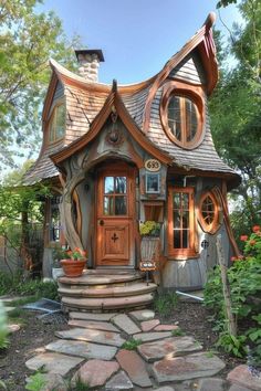 a small house made out of wood and stone