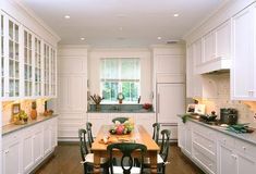 the kitchen is clean and ready to be used for dinner or other entertaining purposes in someone's home