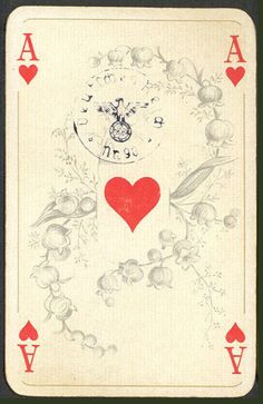 a playing card with an image of a clock on it