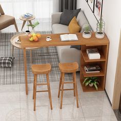 a small table with two stools in front of it and a book shelf on the other side