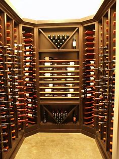 a wine cellar filled with lots of bottles