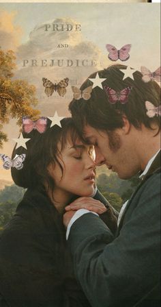 a man and woman standing next to each other in front of a painting with butterflies on it