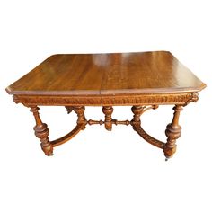 an old wooden table with two legs