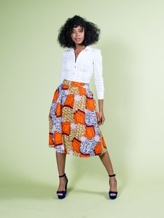 Orange African Skirt | Ankara Midi Skirt | Orange | Sale Orange Skirt For Workwear In Summer, Orange Lined Skirt For Workwear, Orange Workwear Skirt With Lining, Fitted Orange Pleated Skirt, Chic Orange Knee-length Skirt, Chic Knee-length Orange Skirt, Fitted Orange Cotton Skirt, Orange Fitted Cotton Skirt, Fitted Orange Midi Skirt