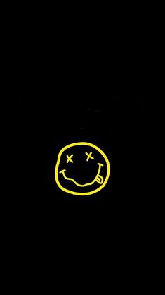 a yellow smiley face on a black background