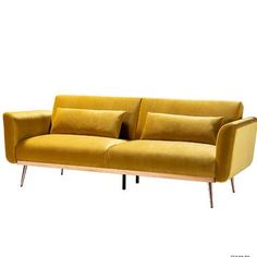 a yellow couch sitting on top of a wooden frame