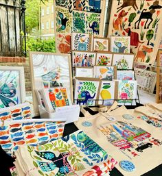 art work on display at an outdoor market