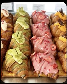 there are many different types of pastries on display