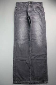 Men's 2015 Lucky Brand Jeans 221 Original Straight Dark Gray Distressed Size 30x32 Zipper Fly             ACTUAL MEASUREMENTS (Measurements are taken of the item lying flat and pulled tight without stretching. All measurements are approximate and in inches):   Waist (Measured from side to side and multiplied times 2): 30 Inseam (Measured from bottom of crouch to end of pants leg): 32 Hip (Measured at the base of the zipper from side to side and multiplied times 2): 40 Thigh (Measured from bottom Gray Low Rise Jeans, Dark Grey Clothes, Gray Clothes, Grunge Pants, Dark Grey Jeans, Thrift Inspo, Gray Jeans, Guys Clothing Styles, Diy Fashion Clothing