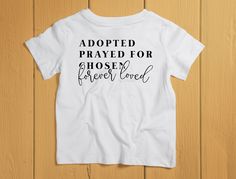 "Kids Adoption Shirt. Toddler Adoption Gift. Family Shirt. Adoption Day Shirt. Adoption Tee. Adoption Family Tee. Adoption Shirts All our shirts are custom made and we are excited to print your order! Details * 100% preshrunk combed ringspun cotton youth and toddler shirts. * Double-needle stitching. * Print is soft to touch. * Unisex fit. * Please message us for personalization requests. Shipping Shipping is free for orders over $35. Please allow 2-4 business days for your order to be printed. Adoption Day Shirts, Adoption Shirts Families, Adoption Shirts, Adoption Day Shirts Families, Dachshund Shirt, Adoption Day