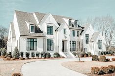 a large white house with lots of windows