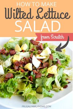 a salad with lettuce, bacon and cheese in it on a white plate