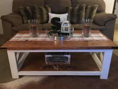 a coffee table with some glasses on it