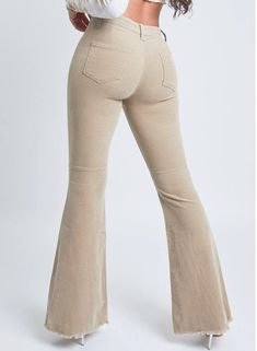 Step up your vintage style in our Junior High Rise Corduroy Flare Pant. These flared pants feature a textured corduroy feel and a bell-bottom silhouette. Designed slim in the hips and thighs, with a high-rise waist and a seam behind the knee for an extra flattering fit. Detailed with a frayed hem to spice things up! We love these styled with a band tee and sneakers for a trendy look or a sweater vest and booties.Product Details:- High-Rise- 1-Button Closure with Zipper- 2 Back Pockets- Belt Loops- Flare SilhouetteSize & Fit (based on size 5):- Inseam: 34"- Rise: 11"- Leg Opening: 26"- Model is wearing a size 3 Size & Fit (based on size 18)- Inseam: 33"- Rise: 12" - Leg Opening: 28"- Model is wearing a size 14 Machine wash cold, inside out. Tumble dry low. 98% Cotton/ 2% Spandex Flare Pant, Junior High, Flared Pants, Pocket Belt, Band Tees, Flare Pants, Sweater Vest, Bell Bottoms, Step Up