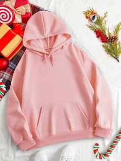 Stay warm and festive this holiday season with our Christmas Printed Fleece Drawstring Hoodie. Made with soft and cozy fleece, this hoodie features a unique festive print and a convenient drawstring hood for added warmth. Perfect for your holiday gatherings or cozy nights at home. Color : Pink Style : Casual Pattern Type : Cartoon Pattern Type : Slogan Details : Drawstring Details : Pocket Type : Pullovers Neckline : Hooded Sleeve Length : Wrist-Length Sleeve Sleeve Type : Drop Shoulder Length : Fleece Hoodie With Drawstring, Winter Cotton Hoodie With Cozy Fit, Cozy Cotton Hoodie For Winter, Winter Hoodie With Drawstring In Pink, Hooded Hoodie With Drawstring For Winter, Cozy Pink Hoodie With Drawstring Hood, Pink Drawstring Sweatshirt For Winter, Trendy Winter Hoodie For Loungewear, Pink Long Sleeve Sweatshirt With Drawstring