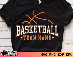 a basketball team name on a black t - shirt with an orange and white design