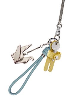 A "Bird of wishes" Origami bag charm made from refined calfskin leather. Also available in Blush. A "Bird of wishes" Origami bag charm made from refined calfskin leather. Silver-tone logo stamp at back. Silver Hoop Hardware at face. Silver Bead-Chain Strap with Clasp Fastening. Approx. 4.25” length. Diy Projects To Make And Sell, Origami Bag, Mini Accessories, Keychain Charm, Closet Accessories, Bird Jewelry, Leather Keychain, Leather Diy, Metal Charm