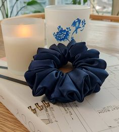 Dive into the depths of elegance with our Navy Blue Silk Scrunchies, a sophisticated addition to your hair accessory collection  The Deluxe design adds an extra luxurious touch to your style. Crafted from the finest silk, these scrunchies ensure a gentle, snag-free hold that protects and pampers your hair. The rich navy blue hue embodies a timeless sophistication, making it a perfect match for both casual daywear and evening elegance. Our navy blue silk scrunchies are the epitome of understated Hair Accessories Bridesmaid, Silk Scrunchies, Bridesmaid Hair Accessories, Hair Accessories Collection, Handmade Gifts For Her, Gift For Her Birthday, Blue Silk, Hair Tie, Blue Hues