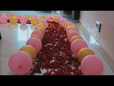 balloons and confetti on the floor at a party